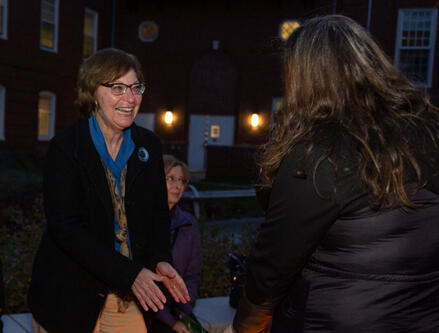 melanie norton accepting an award gift