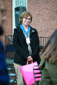 melanie norton smiles as she hears the award announced