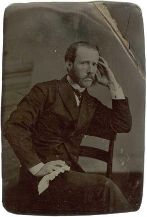 Dr. James Henry Etheridge as a young man, seated