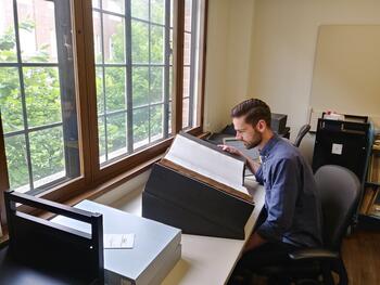 Jones reading the Jefferson Medical College medical clinic records at the Medical Historical Library.