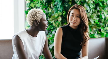image of two women talking