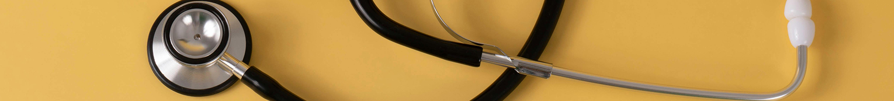 stethoscope on yellow background
